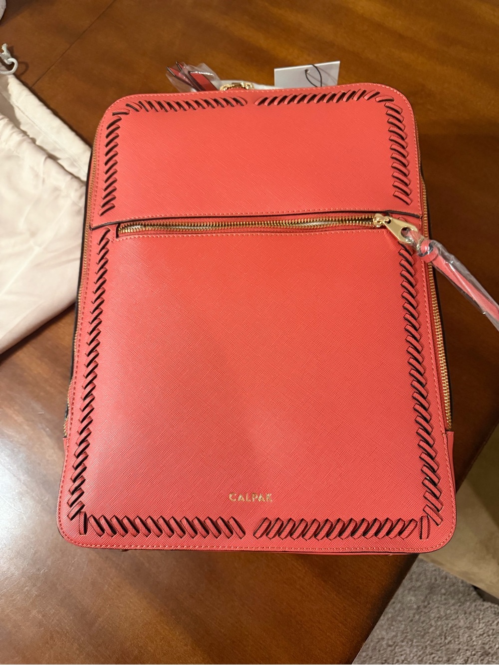 Calpak Coral Pink Leather Backpack with Whipstitch Trim
